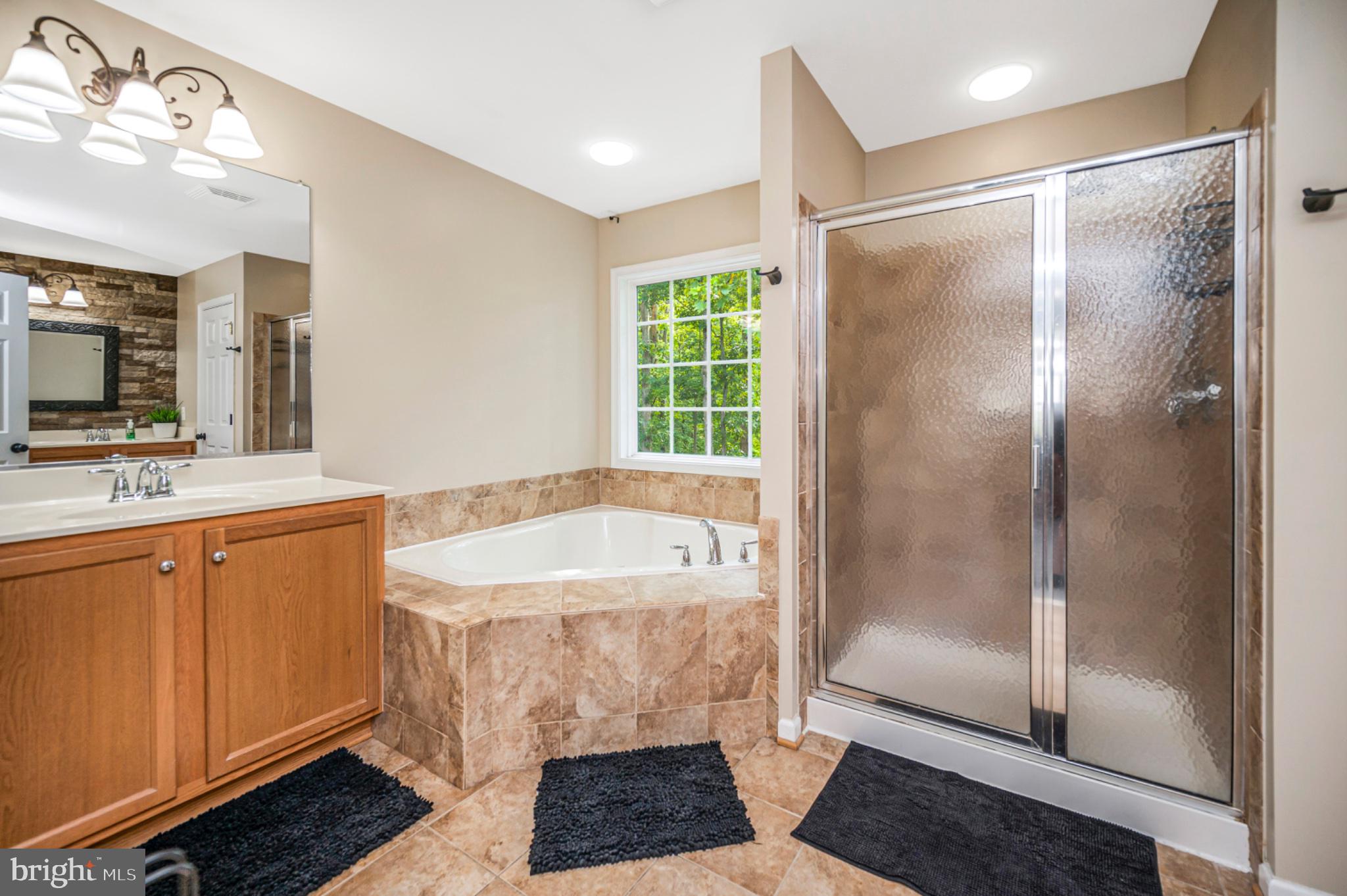 239 Toluca Road Stafford, VA 22556 - Photo 58 of 75 Elegant bathroom retreat with natural light.