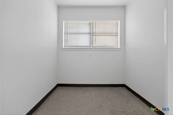 a view of a small space with window