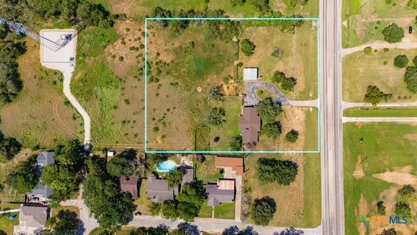 a picture of a bathroom with a shower