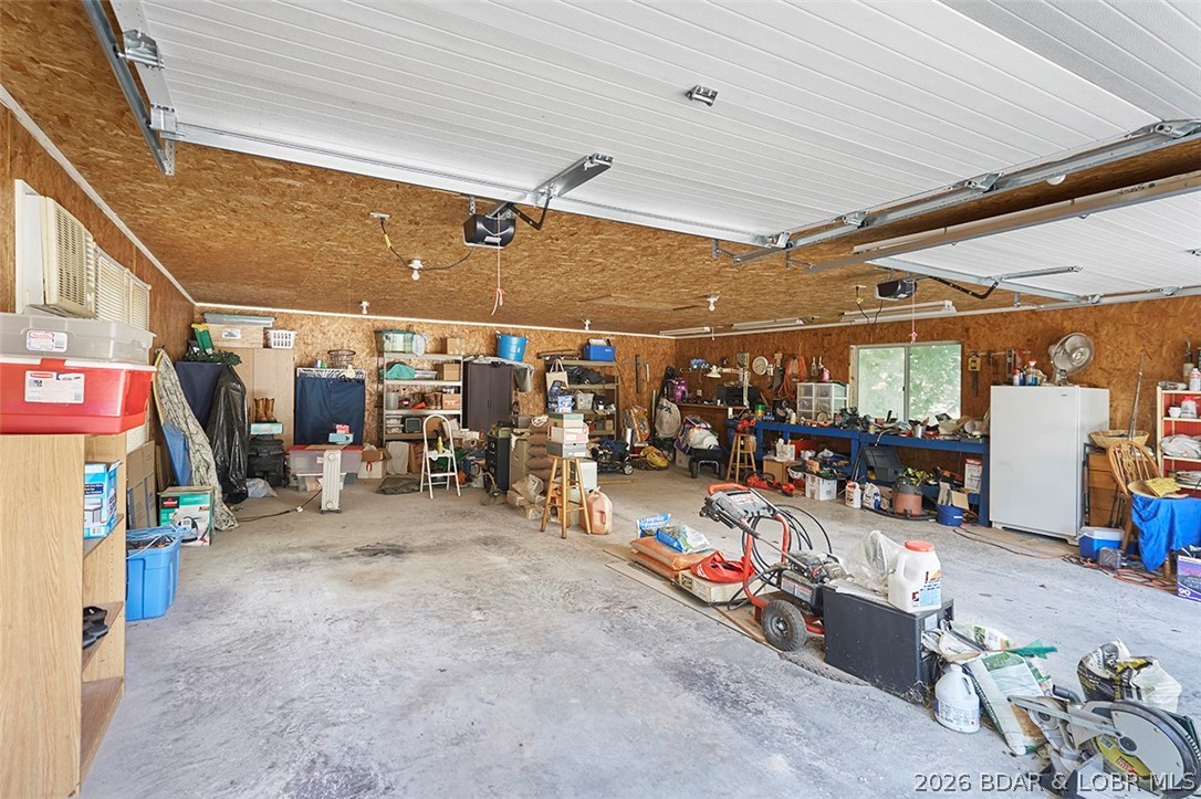 1425 Lick Creek Road Edwards, MO 65326 - Photo 38 of 46 28x32 2 car garage with plenty of room for worksho