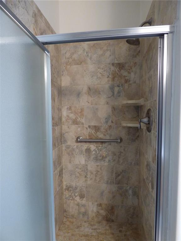 383 Eagle Lane Apollo, PA 15613 - Photo 14 of 25 a bathroom with a glass shower door
