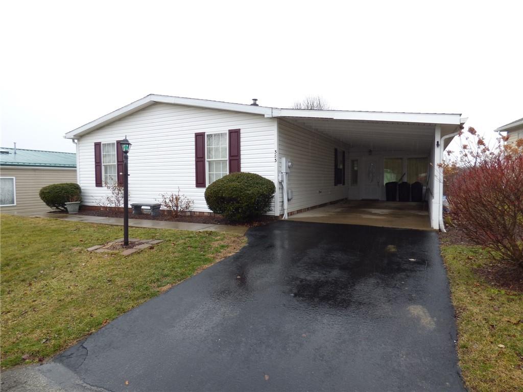 383 Eagle Lane Apollo, PA 15613 - Photo 24 of 25 a backyard of a house with table and chairs