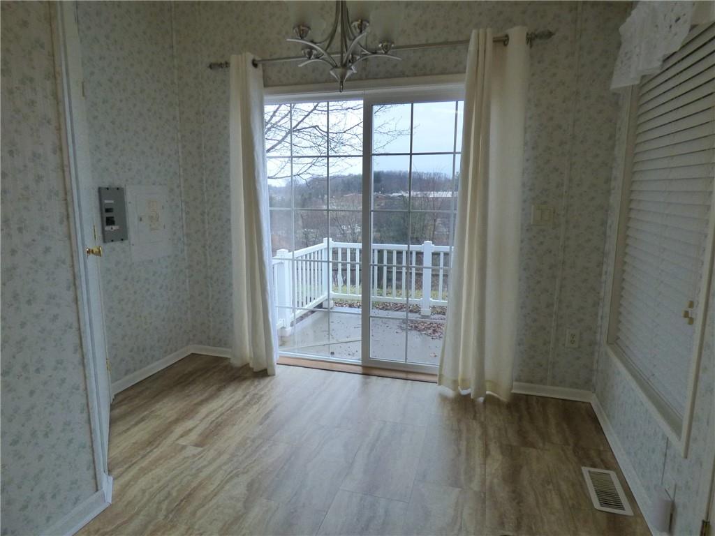 383 Eagle Lane Apollo, PA 15613 - Photo 6 of 25 a view of entryway with wooden floor
