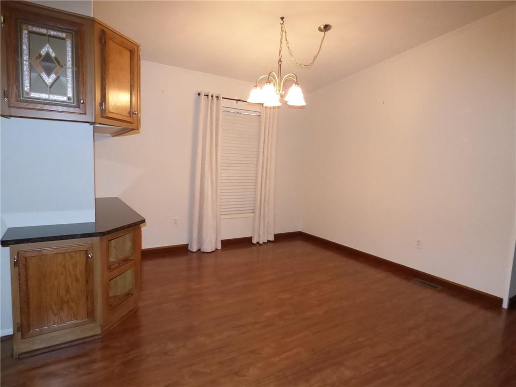 383 Eagle Lane Apollo, PA 15613 - Photo 7 of 25 a view of a room with an entryway and chandelier