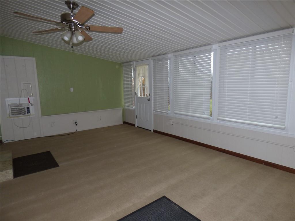 383 Eagle Lane Apollo, PA 15613 - Photo 10 of 25 a view of a livingroom with a ceiling fan and window