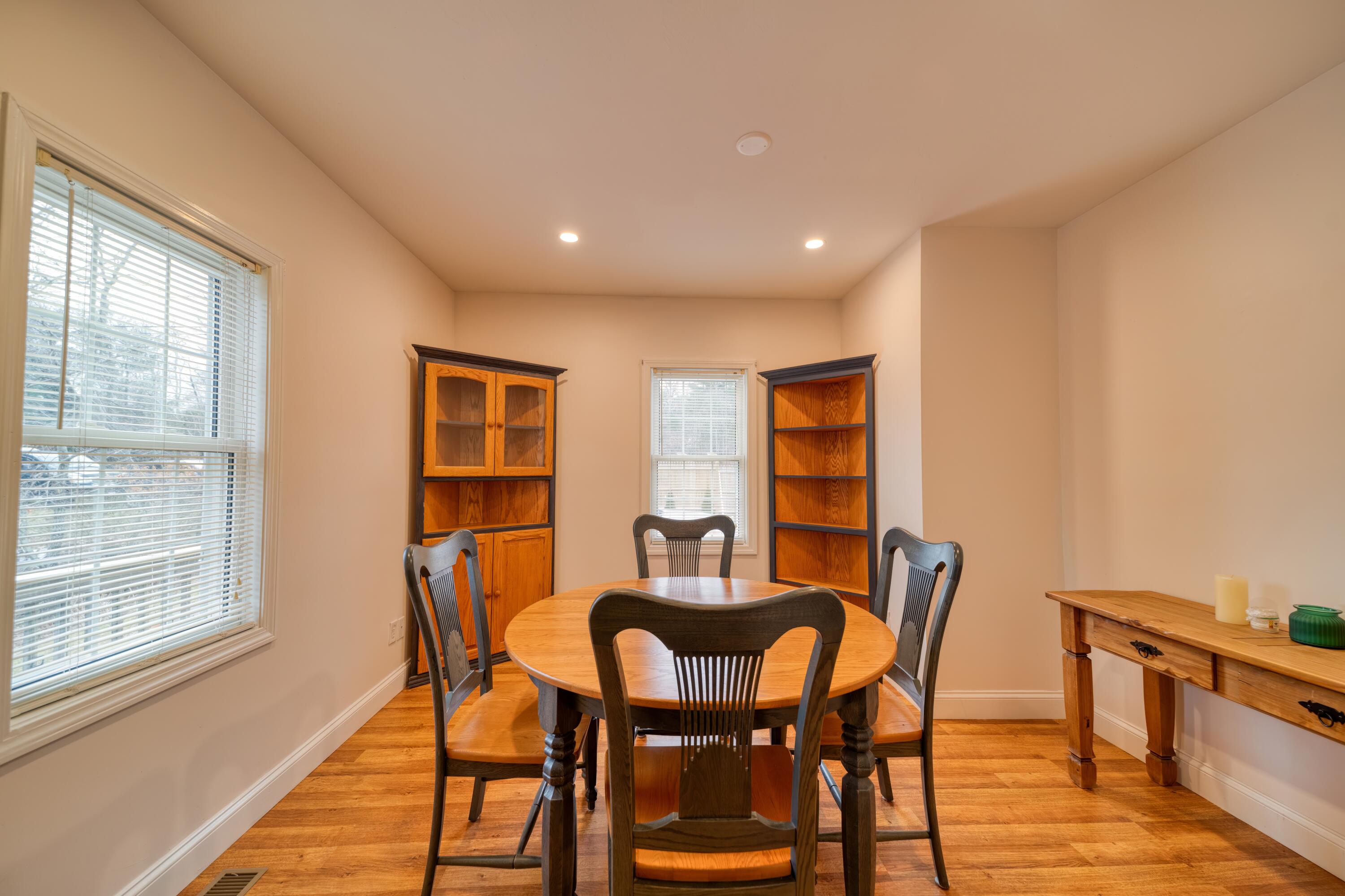331 Cotuit Road Mashpee, MA 02649 - Photo 11 of 22 a view of a dining room with furniture and wooden floor