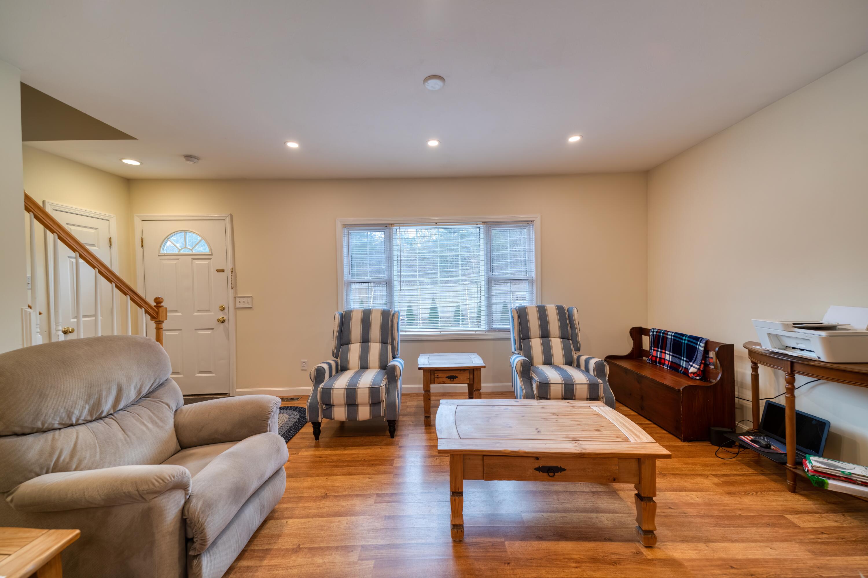 331 Cotuit Road Mashpee, MA 02649 - Photo 12 of 22 a living room with furniture and wooden floor