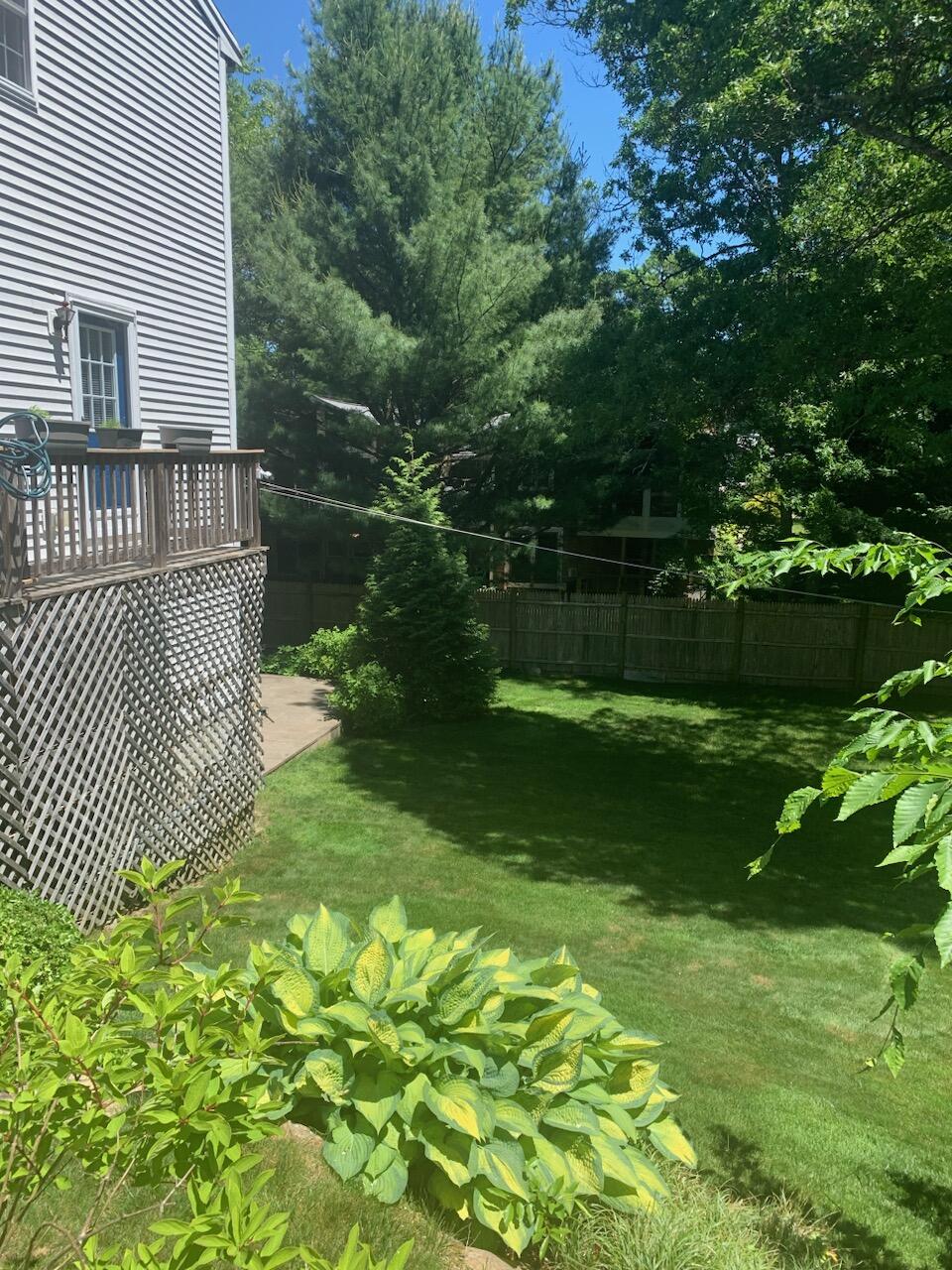 331 Cotuit Road Mashpee, MA 02649 - Photo 22 of 22 a view of a backyard with a garden