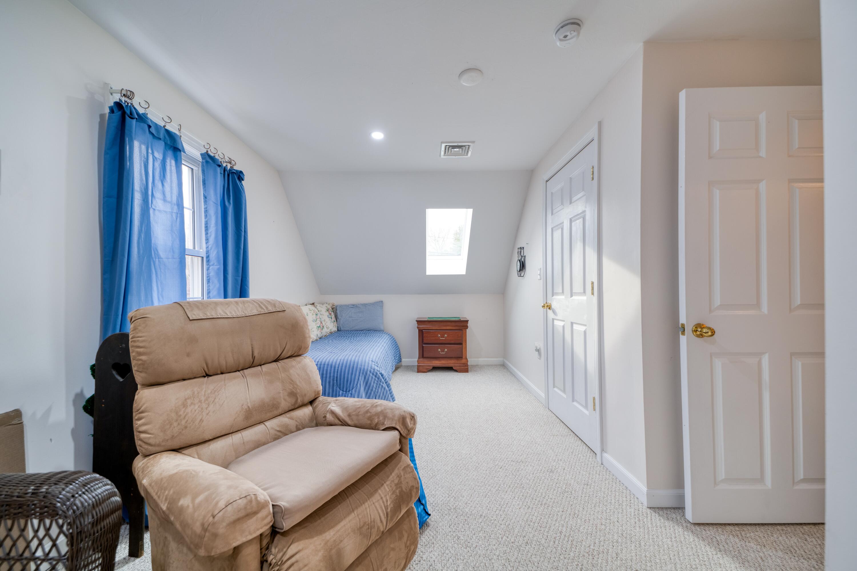 331 Cotuit Road Mashpee, MA 02649 - Photo 6 of 22 a living room with furniture and a window