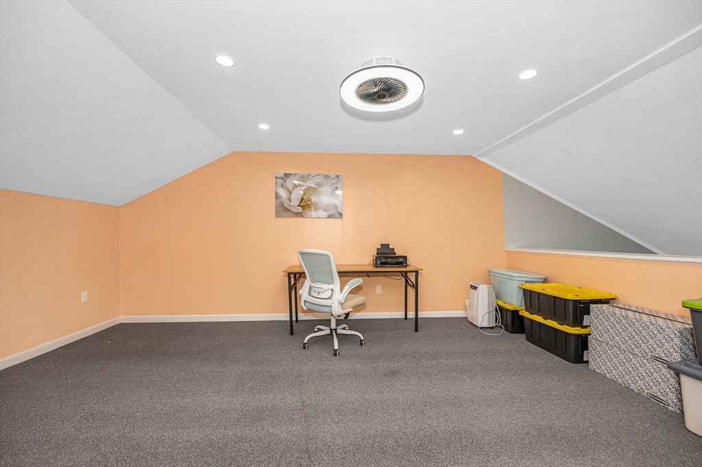 20 Chandler Drive, Unit 20 Atkinson, NH 03811 - Photo 18 of 33 a view of a room with chairs