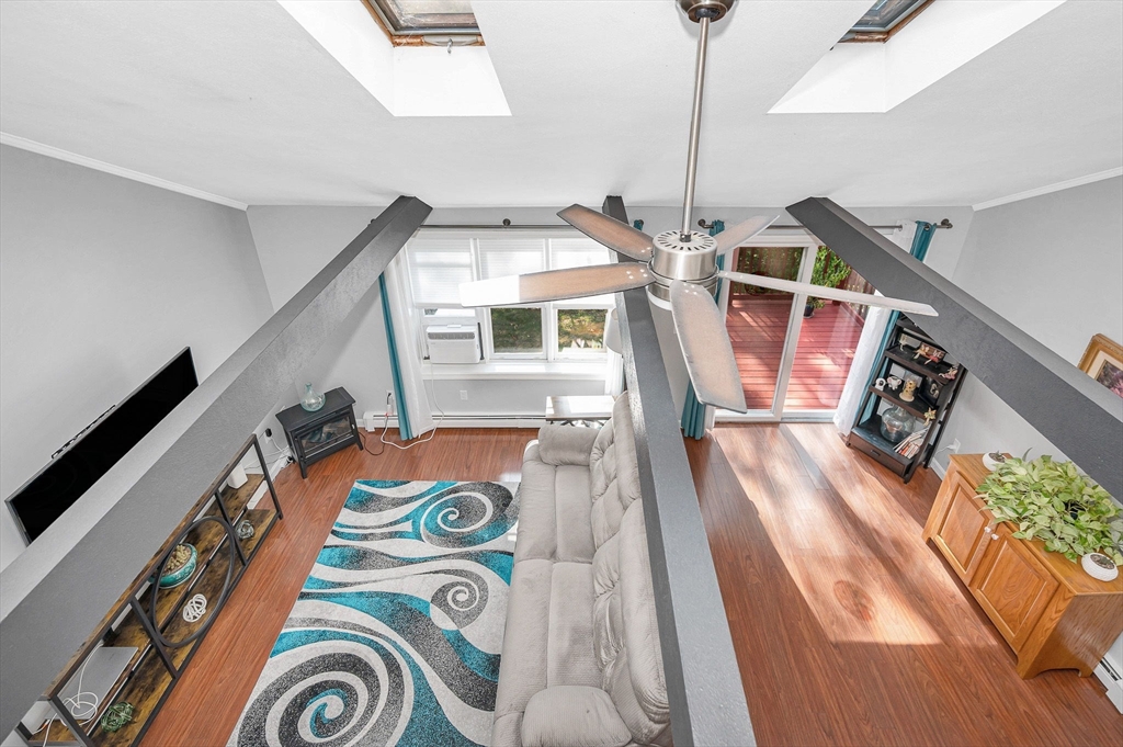 20 Chandler Drive, Unit 20 Atkinson, NH 03811 - Photo 21 of 33 a view of an entryway with wooden floor