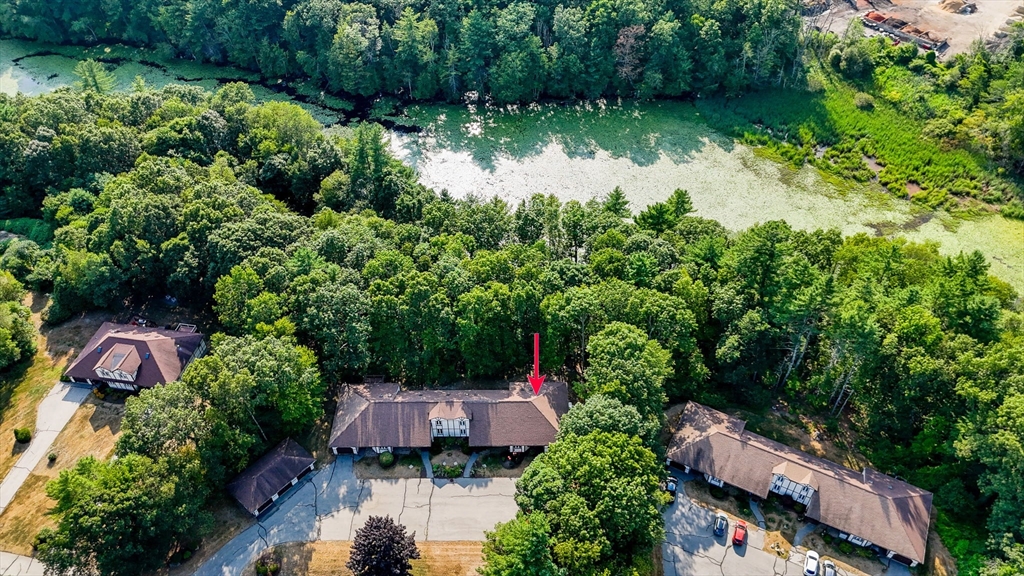 20 Chandler Drive, Unit 20 Atkinson, NH 03811 - Photo 31 of 33 an aerial view of residential house with outdoor space and lake view