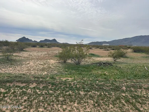 a view of lake with mountain