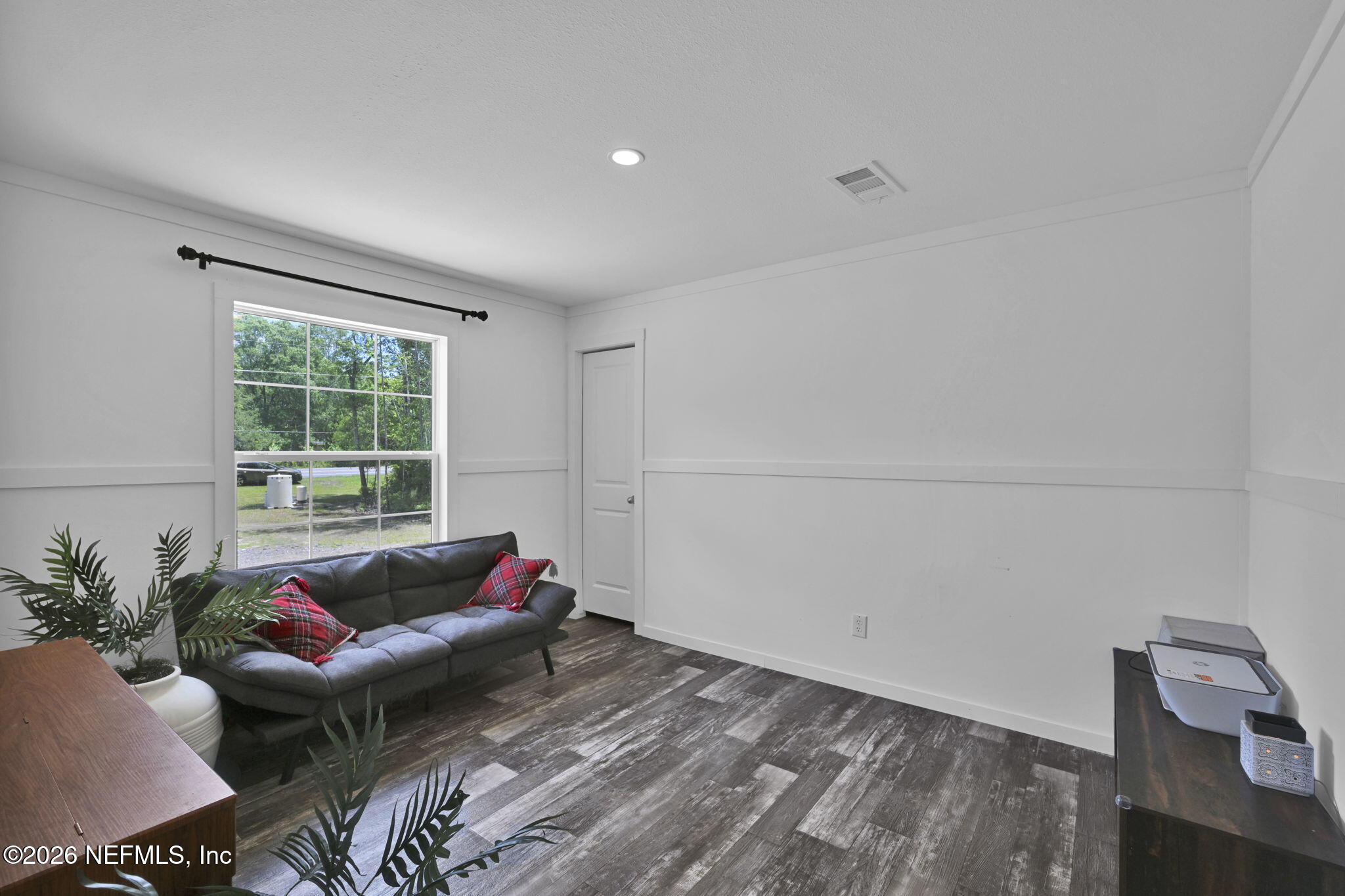 540783 Lem Turner Road Callahan, FL 32011 - Photo 26 of 36 a living room with furniture and window
