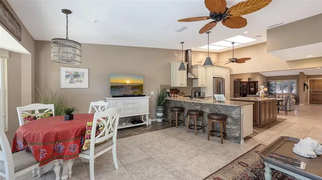 a view of a livingroom with furniture and a chandelier