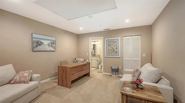 a living room with furniture and window