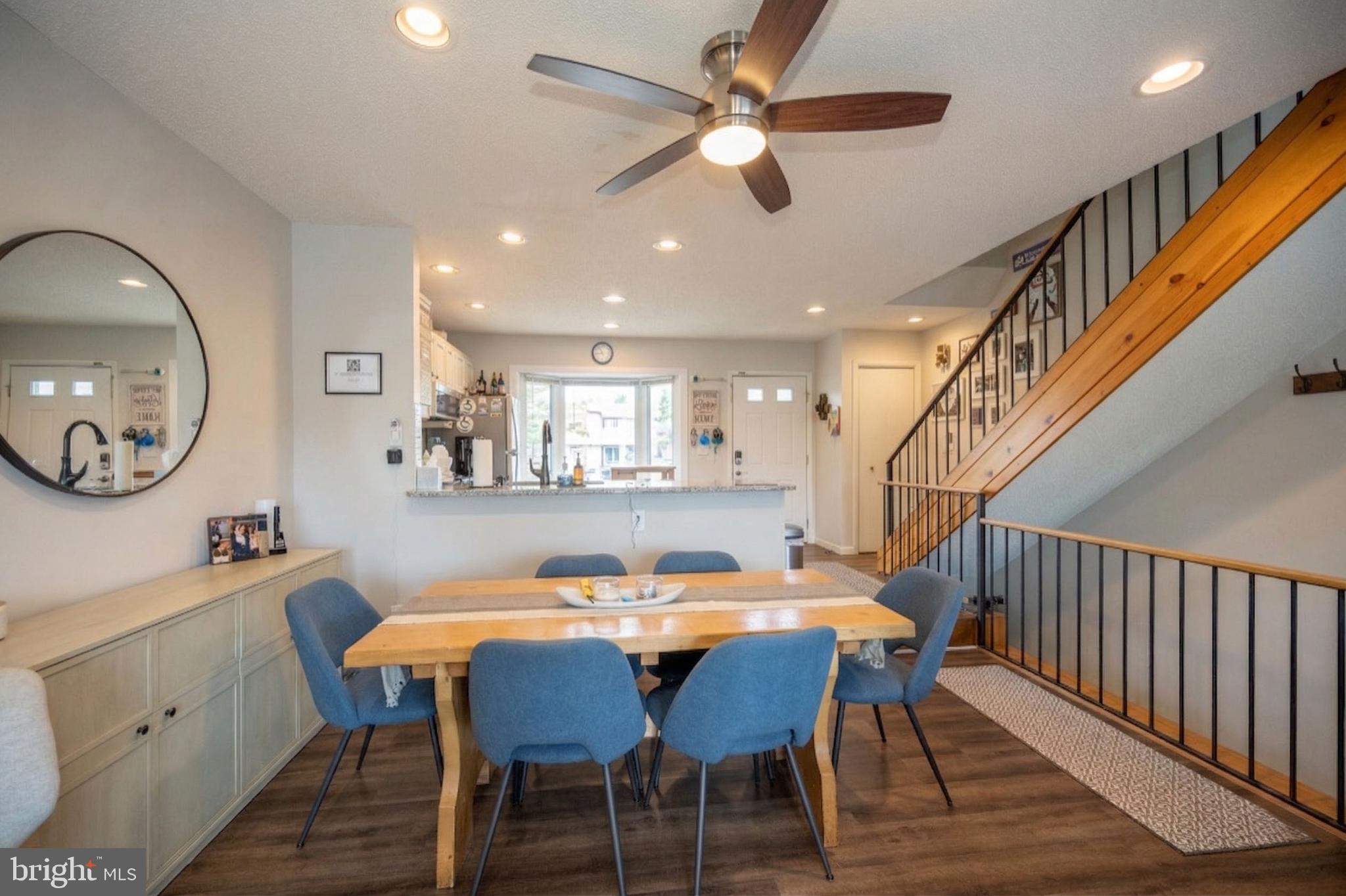 257 Marsh Hill Road, Unit 27 McHenry, MD 21541 - Photo 5 of 64 a view of a dining room with furniture and a chandelier