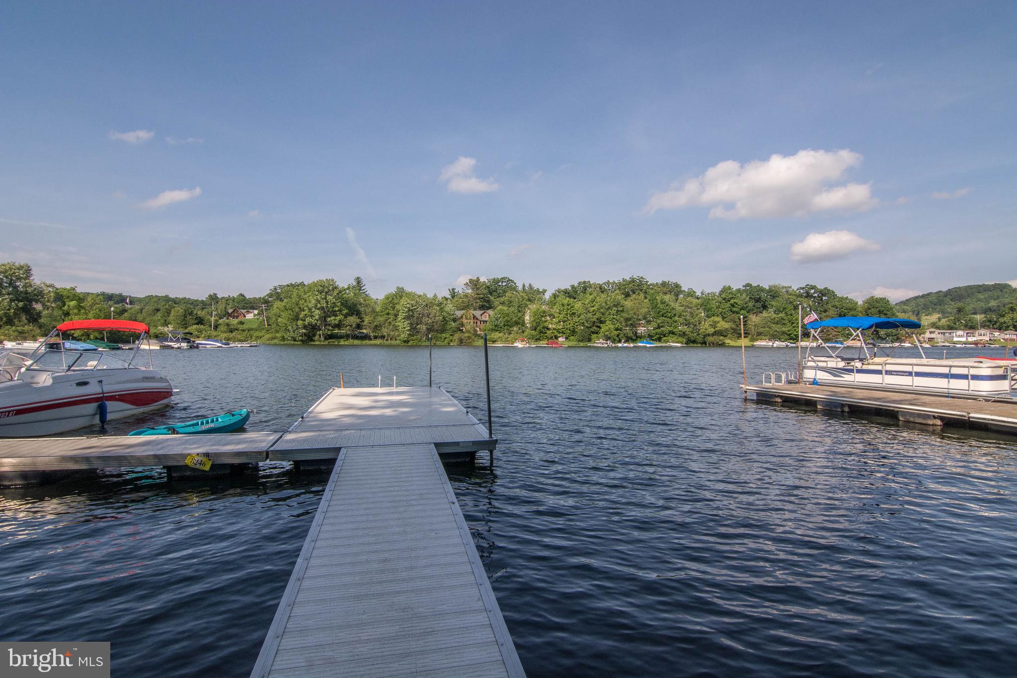 257 Marsh Hill Road, Unit 27 McHenry, MD 21541 - Photo 54 of 64 a view of a lake with boats and a lake view