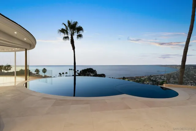 a view of a patio with swimming pool