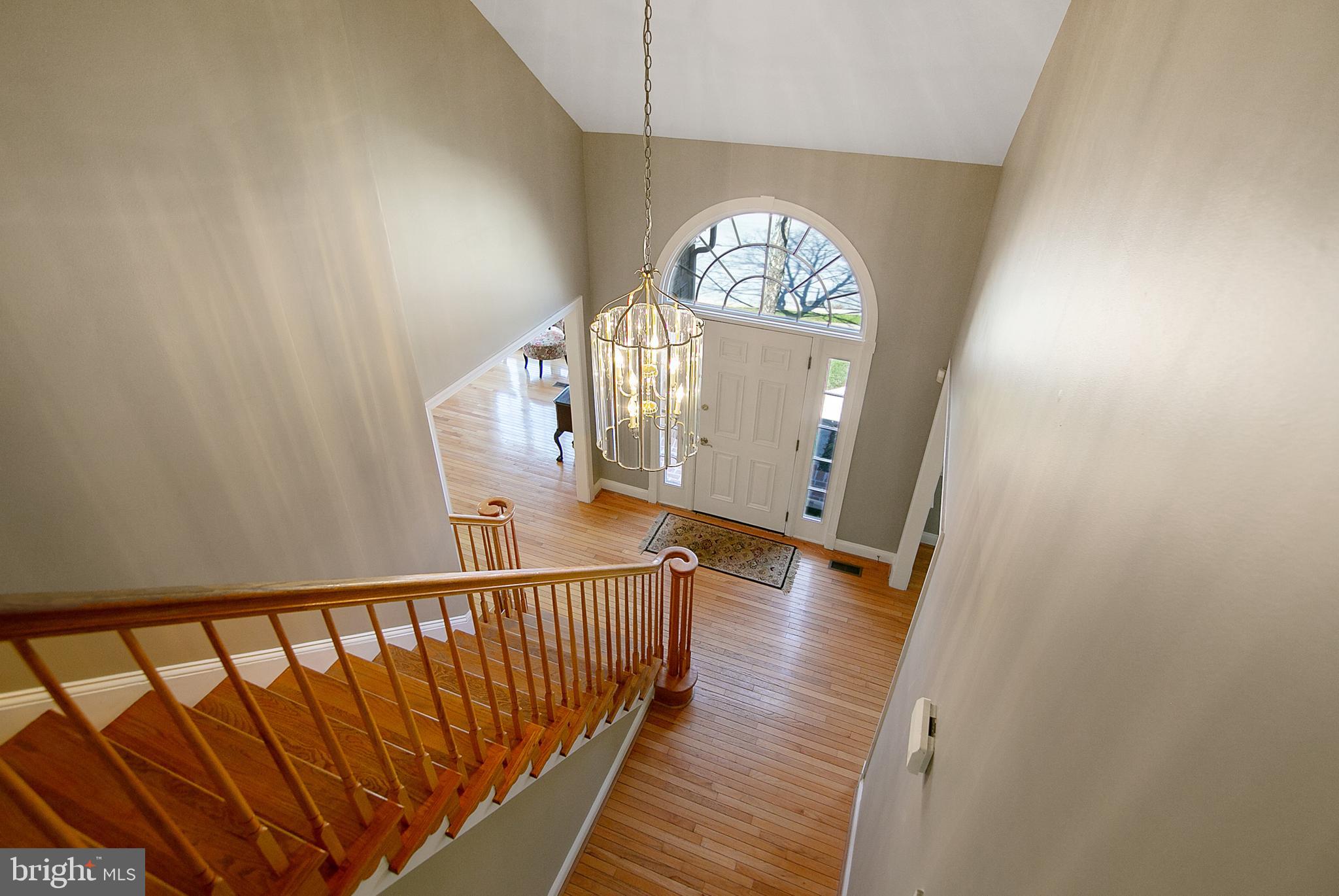 6400 Empty Song Road Columbia, MD 21044 - Photo 12 of 42 Grand 2-story foyer