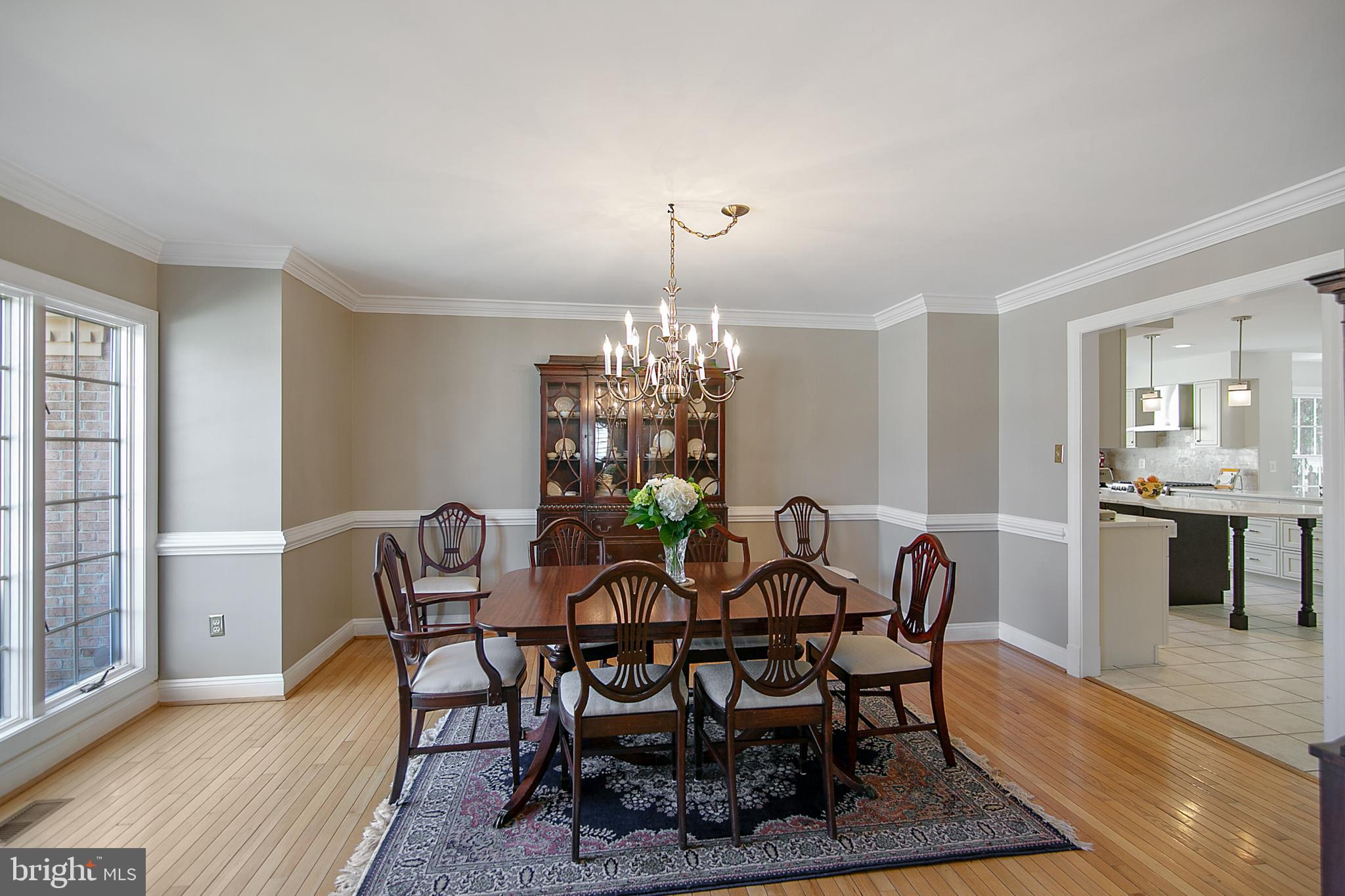 6400 Empty Song Road Columbia, MD 21044 - Photo 17 of 42 Dining room w/crown molding & chair rail