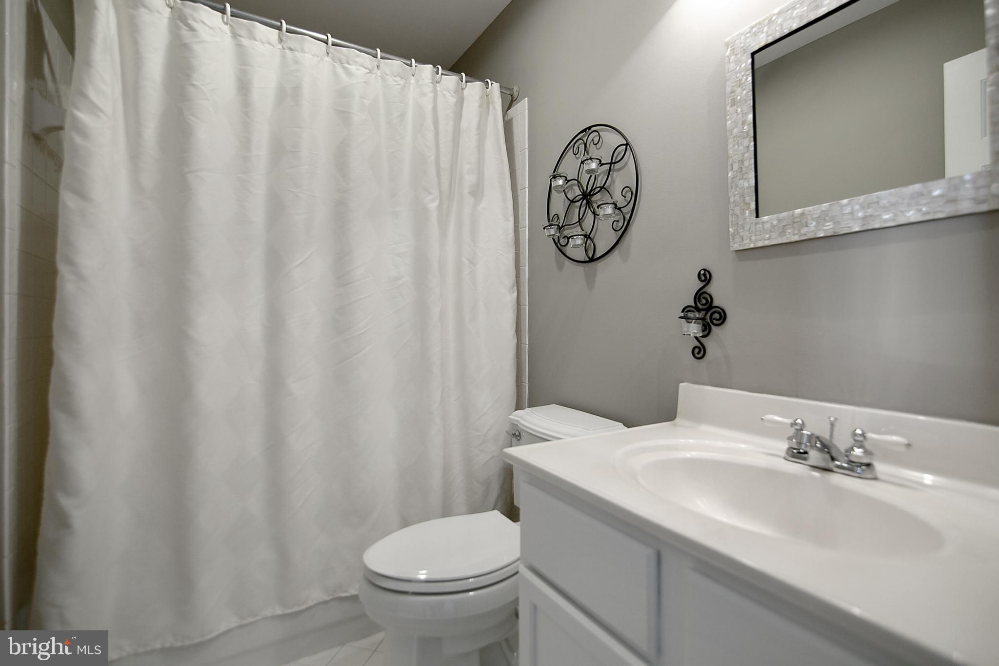 6400 Empty Song Road Columbia, MD 21044 - Photo 26 of 42 2nd bedroom en suite full bath w/refinished vanity