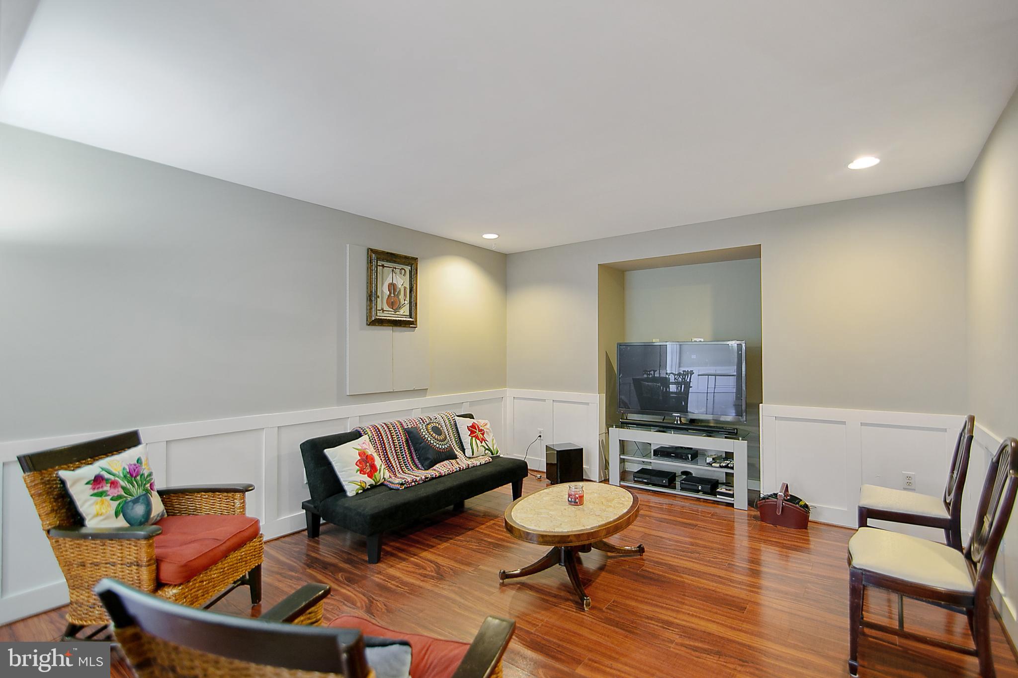 6400 Empty Song Road Columbia, MD 21044 - Photo 30 of 42 Finished lower level w/batten board molding