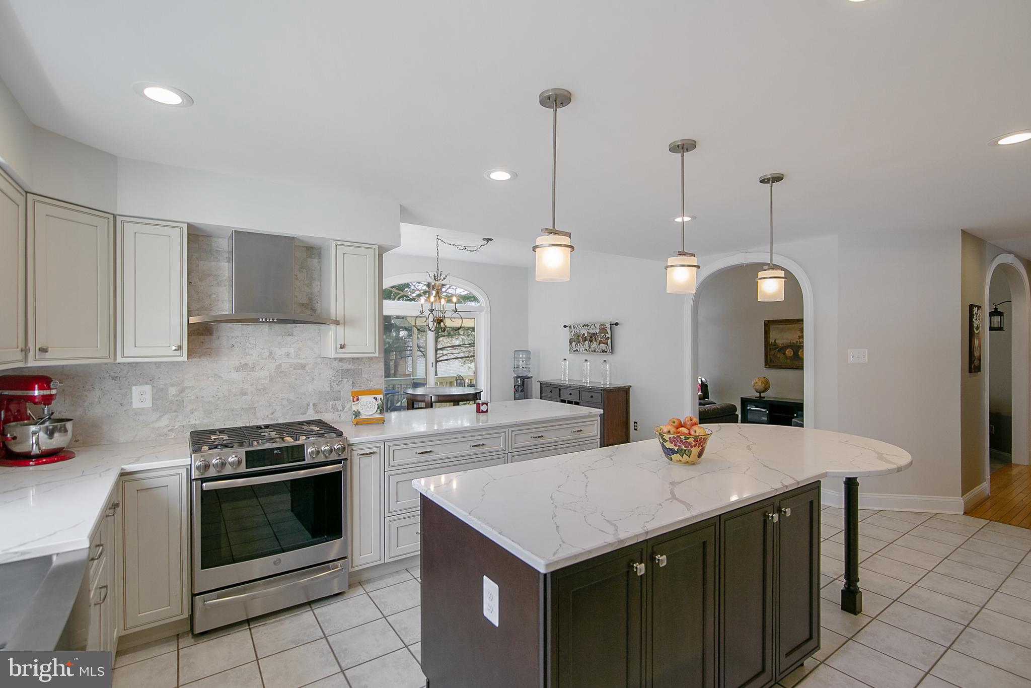 6400 Empty Song Road Columbia, MD 21044 - Photo 6 of 42 Quartz counters & marble tile backsplash