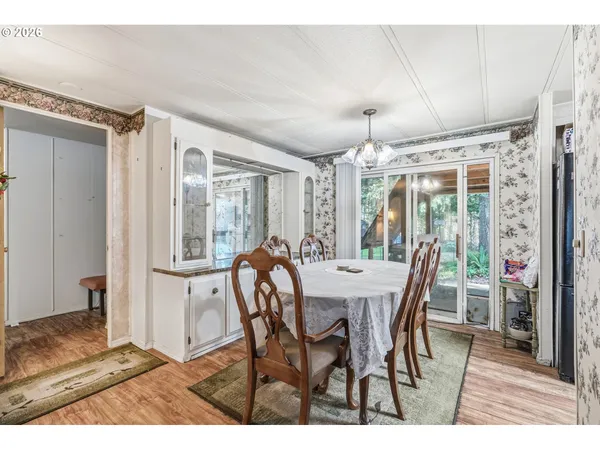 a view of a dining room with furniture window and outside view