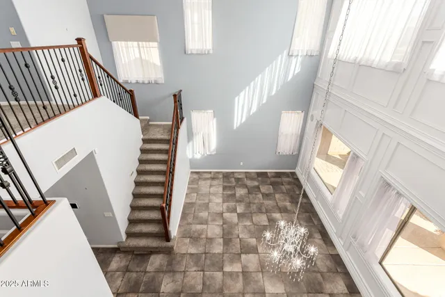 a view of room with window and ceiling fan