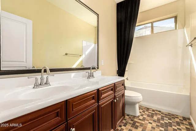 a kitchen with stainless steel appliances granite countertop a sink and a cabinets