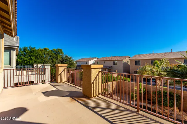 a view of a swimming pool with chairs