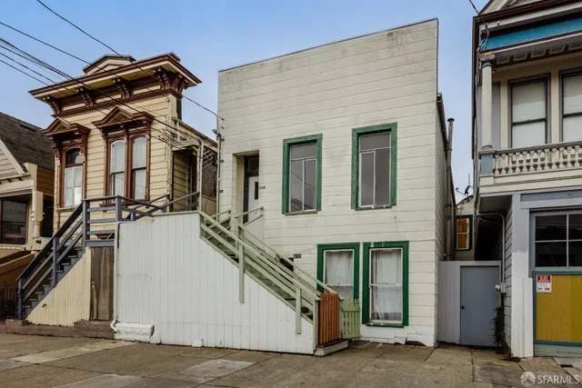 a front view of a house with a garage