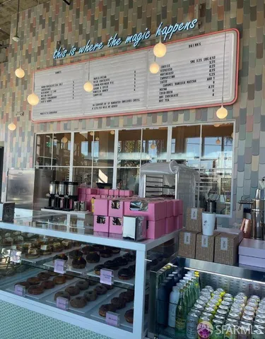 a front view of a building with outdoor space