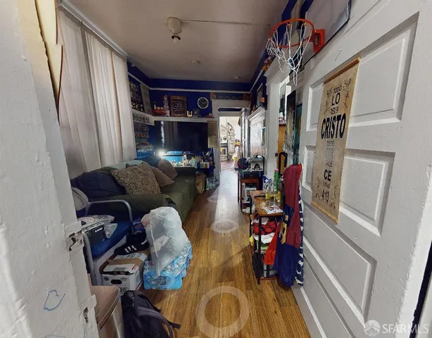 a view of a entryway with furniture and toys