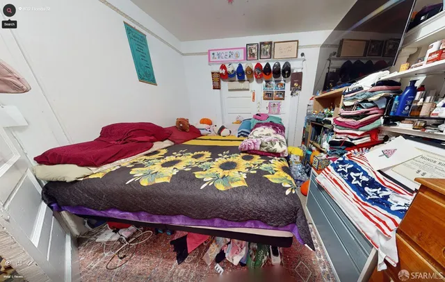 a bed room with a bed and a couch