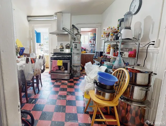 a living room filled with furniture and a rug