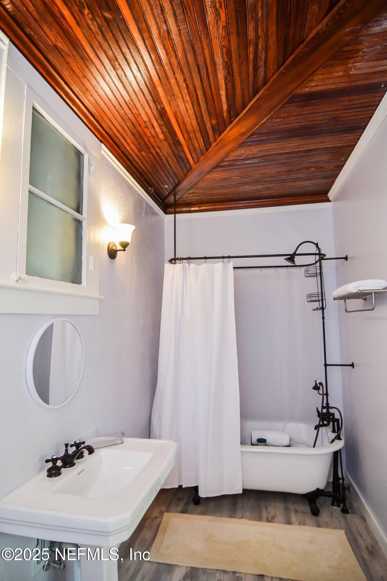 103 Beacon Street Interlachen, FL 32148 - Photo 11 of 31 a bathroom with a sink and a mirror