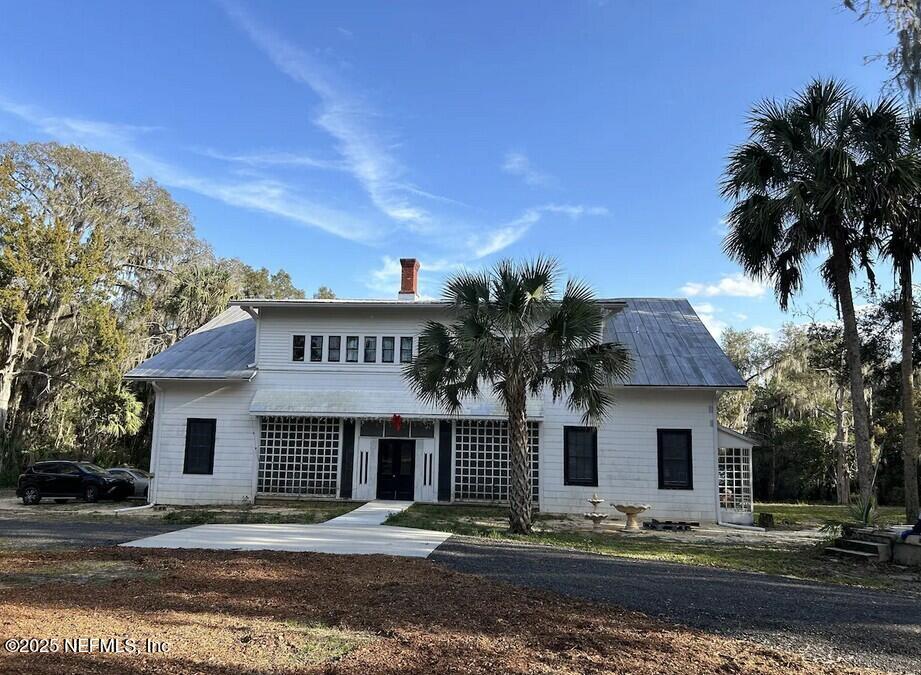 103 Beacon Street Interlachen, FL 32148 - Photo 21 of 30 a front view of a house with a yard