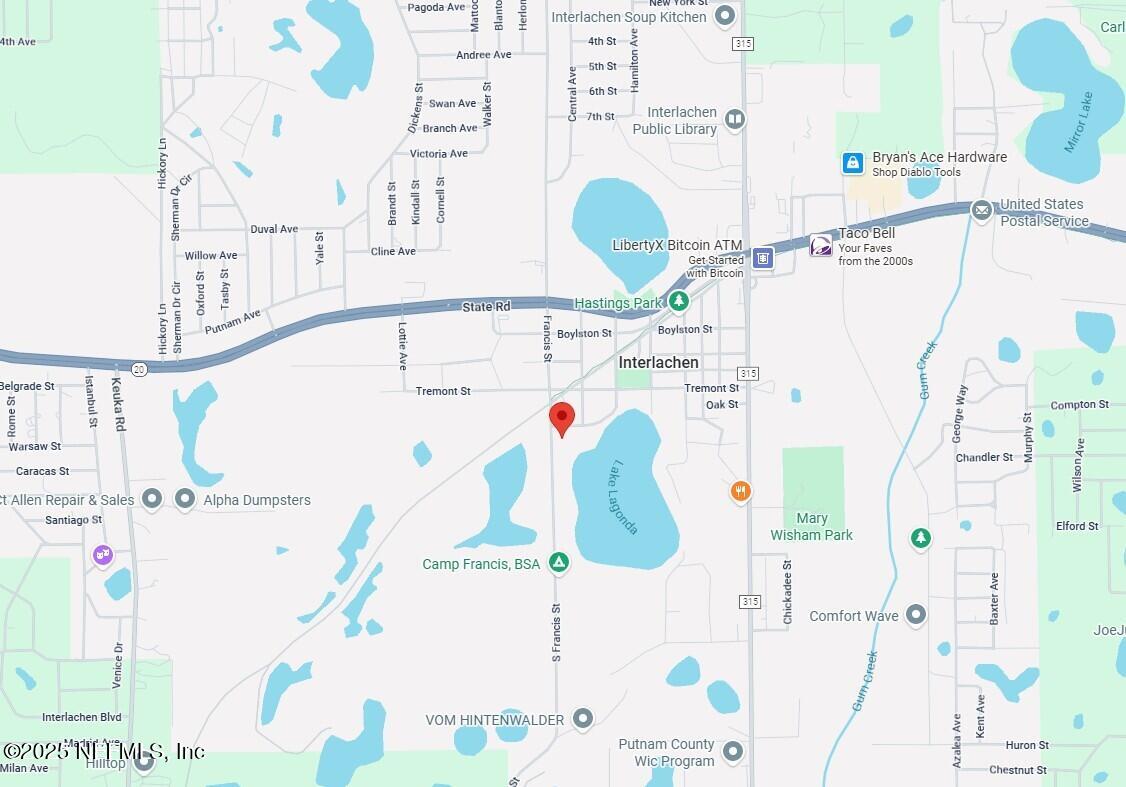 103 Beacon Street Interlachen, FL 32148 - Photo 29 of 31 a bathroom with a sink mirror and vanity