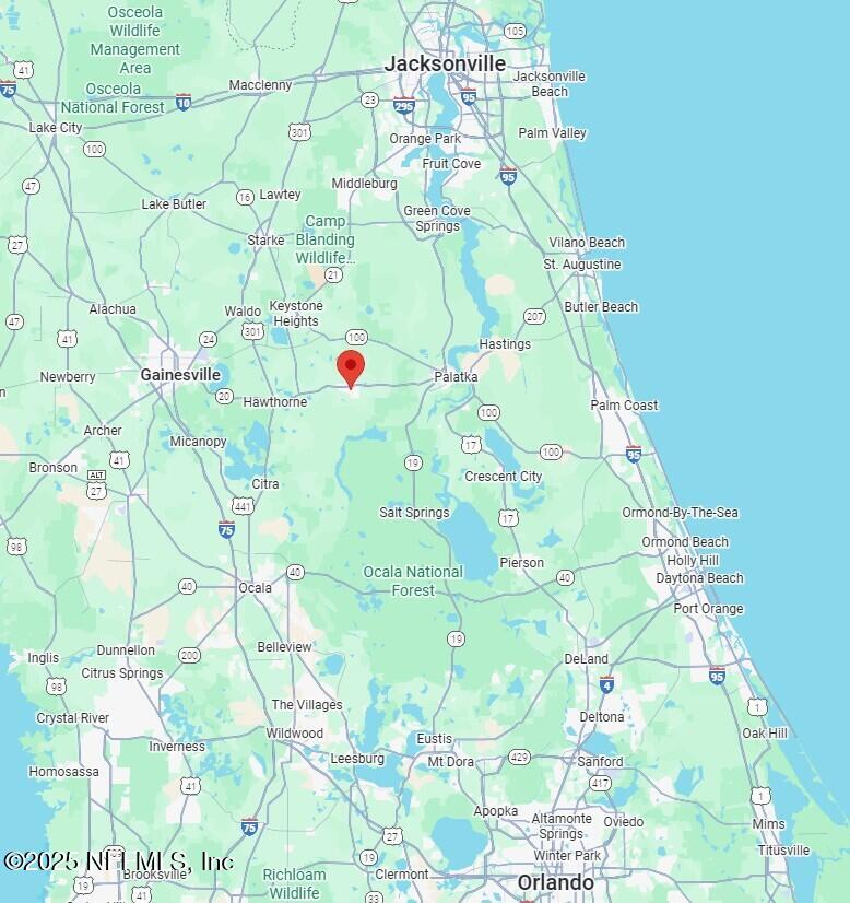 103 Beacon Street Interlachen, FL 32148 - Photo 31 of 31 a white bath tub sitting in a bathroom