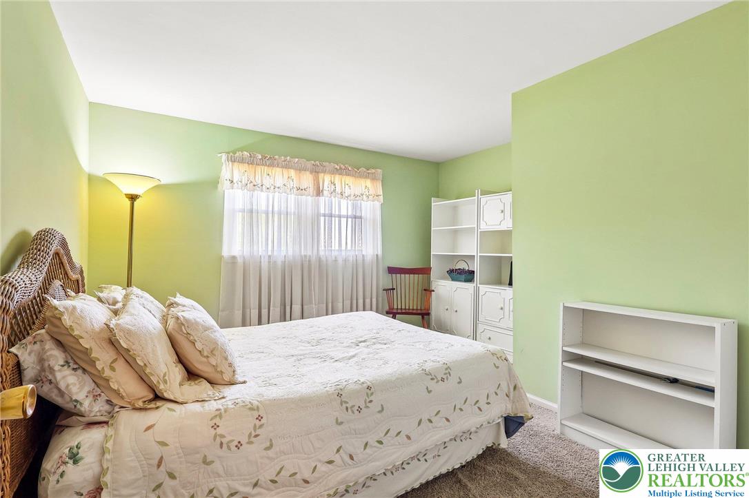 574 Carol Lane Bath, PA 18014 - Photo 30 of 46 a bedroom with a bed and a window