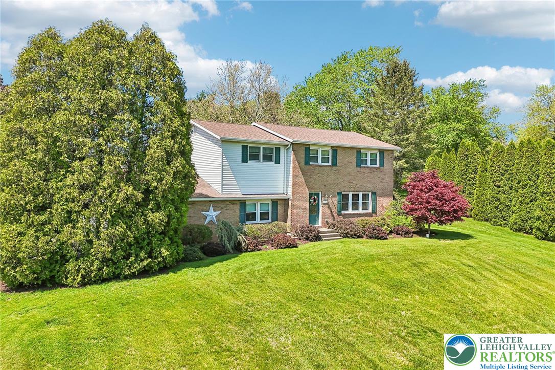 574 Carol Lane Bath, PA 18014 - Photo 3 of 46 a front view of a house with garden