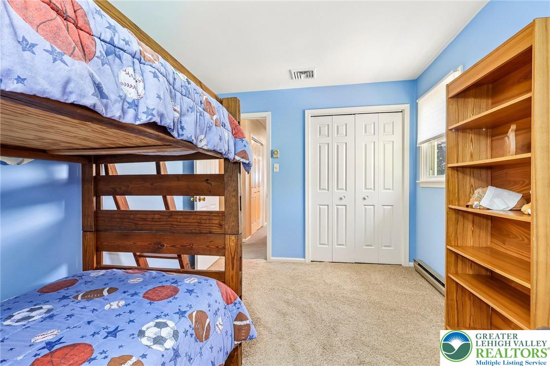 574 Carol Lane Bath, PA 18014 - Photo 32 of 46 a bedroom with a bed and a window