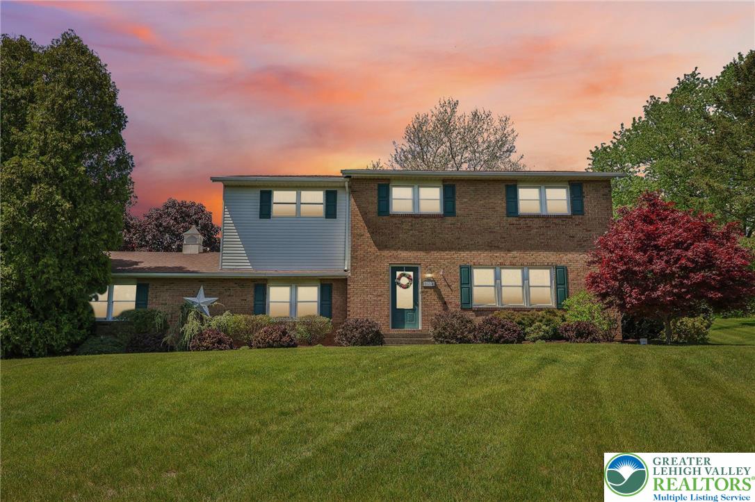 574 Carol Lane Bath, PA 18014 - Photo 45 of 46 a front view of a house with garden