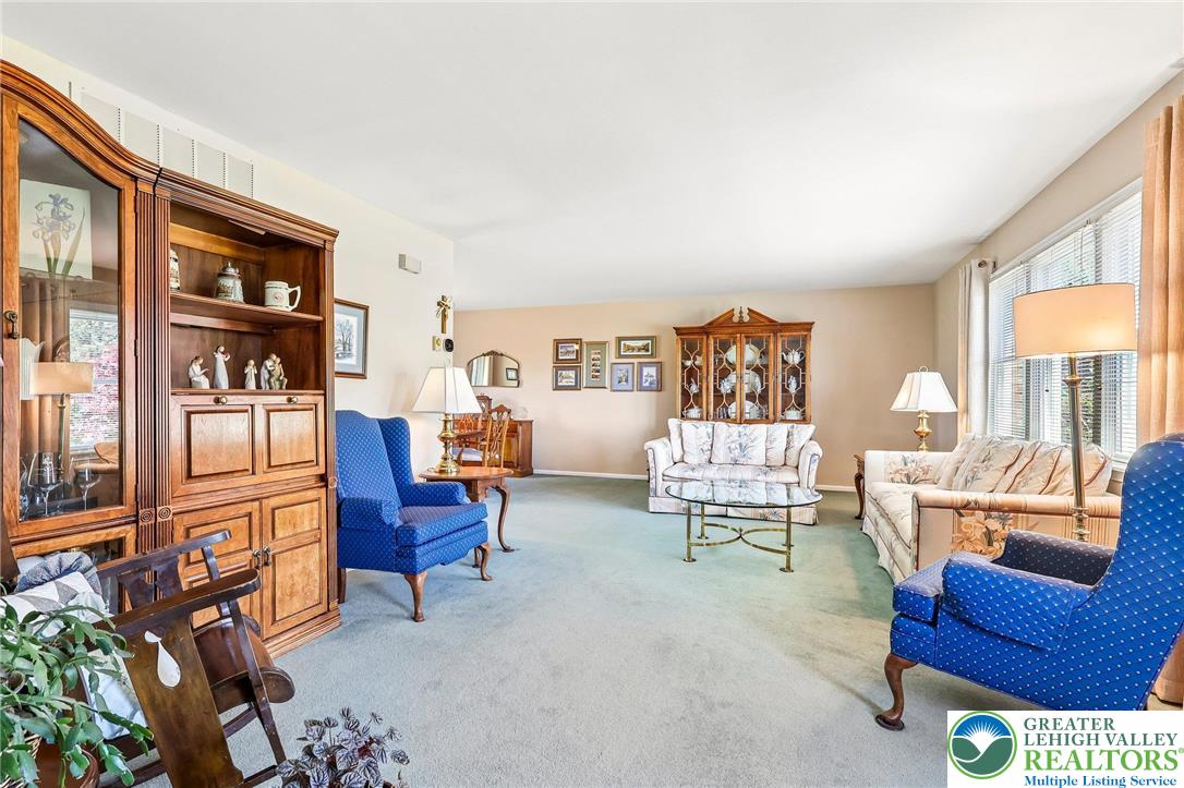 574 Carol Lane Bath, PA 18014 - Photo 10 of 46 a living room with furniture and a floor to ceiling window