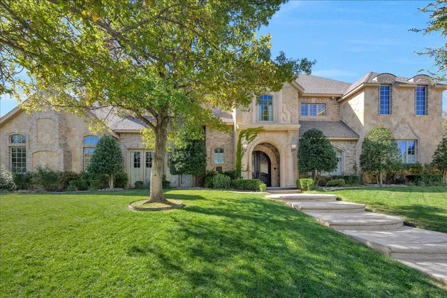 a backyard of a house with seating space