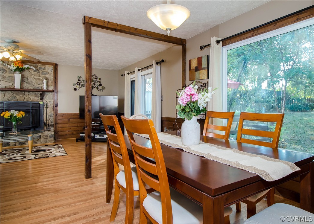 7315 Drexelbrook Road Chesterfield, VA 23832 - Photo 7 of 25 a view of a dining room with furniture a chandelier and wooden floor