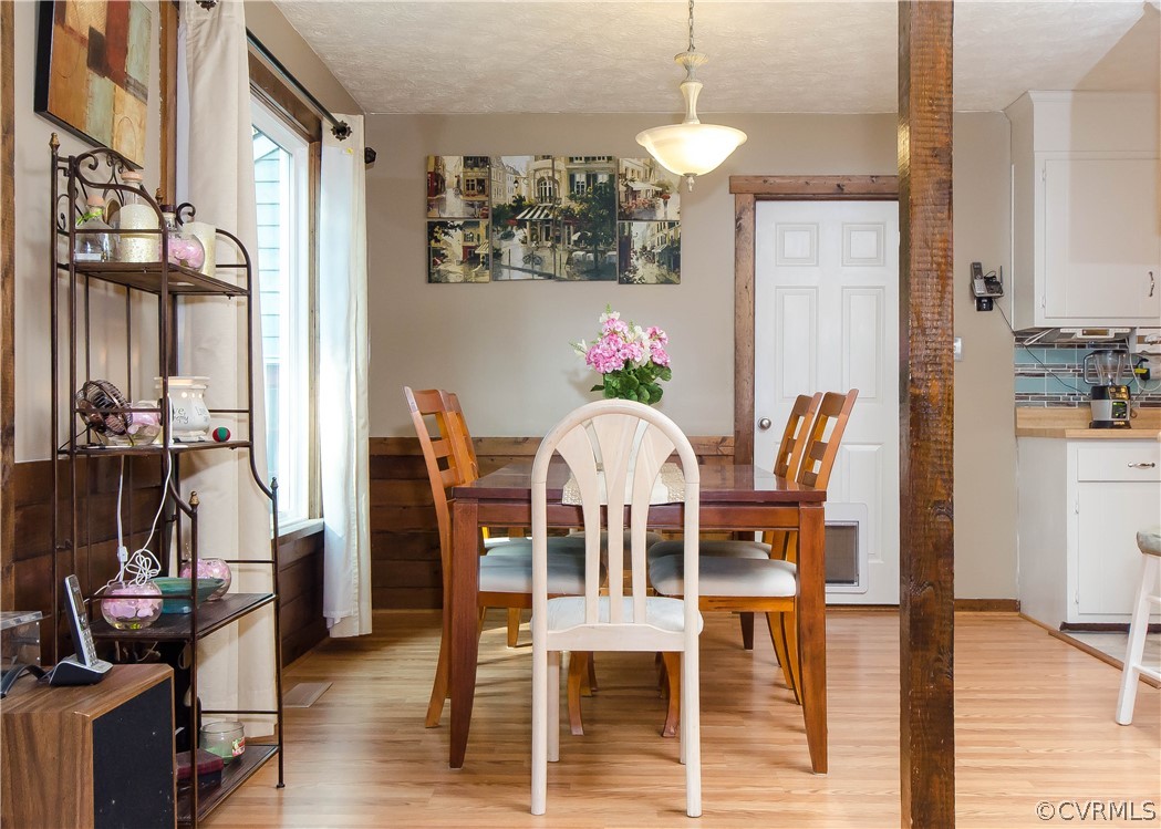 7315 Drexelbrook Road Chesterfield, VA 23832 - Photo 8 of 25 a view of a dining room with furniture and wooden floor
