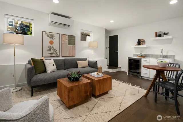 a living room with furniture and a table